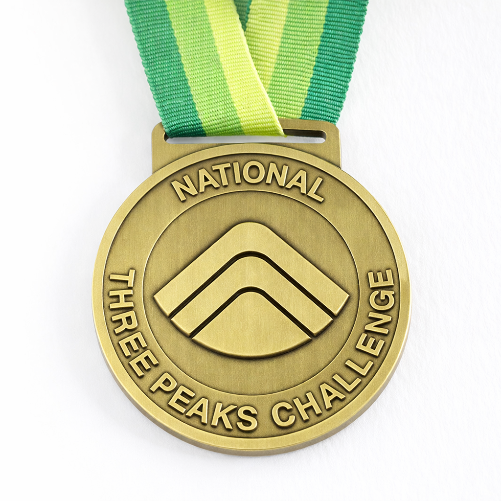 Front of the National Three Peaks Challenge medal.
