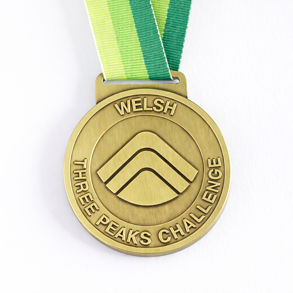 Front of the Welsh Three Peaks Challenge medal.